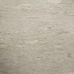 Angelica quartzite slab featuring light beige color and subtle horizontal striations. Angelica quartzite slab with light beige color and subtle horizontal striations