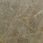 Decca quartzite slab featuring beige and grey fibrous patterns. Decca quartzite slab with beige and grey fibrous patterns
