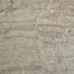 Renoir quartzite slab featuring swirling gray, white and rust hues, ideal for countertops in Warrenville. Renoir quartzite slab with swirling gray, white and rust hues from Warrenville.