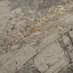 Tormento quartzite slab featuring grey, beige and rust veining, ideal for countertops in Darien. Tormento quartzite slab with grey, beige and rust veining from Darien.