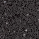 Dark black quartz with grey aggregate and reflective crystals. Dark black quartz surface with grey aggregate and reflective crystals for shimmering depth.