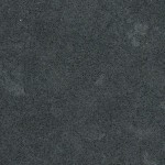 Dark charcoal quartz with subtle speckles. Dark charcoal quartz surface with subtle speckles for a sleek, modern look.