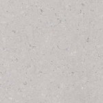 Light beige quartz with subtle speckles and gentle texture. Light beige quartz surface with subtle speckles and gentle texture.