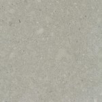 Warm taupe quartz with grey undertones and delicate speckles. Warm taupe quartz surface with grey undertones and delicate speckles throughout, creating a sophisticated neutral look.