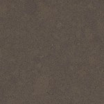 Charcoal grey quartz with blue undertones and subtle texture. Charcoal grey quartz surface with blue undertones and subtle texture reminiscent of natural Lagos stone.