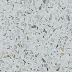 Quartz Reflections terrazzo-style quartz countertop slab featuring a light gray base with multicolored chips, ideal for countertops in Mount Prospect. Quartz Reflections terrazzo-style quartz countertop slab with light gray base and multicolored chips in Mount Prospect.