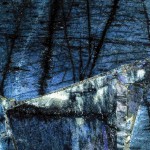 Indigo quartz countertop slab with deep blue tones and metallic veining, ideal for countertops in Wilmette. Indigo quartz countertop slab featuring deep blue tones with metallic veining in Wilmette.