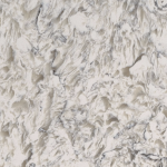 Montclair White quartz slab offering a blend of warm beige and cream hues with delicate grey patterning, suitable for countertops and decorative surfaces. Montclair White quartz slab showcasing warm beige tones with subtle cream and grey patterning