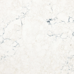 Travella quartz slab from Cambria featuring a soft white base with dramatic dark gray veining in River Forest Travella quartz slab with a soft white base and dramatic dark gray veining in River Forest
